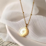 Round Compass Pendant Necklace on Material