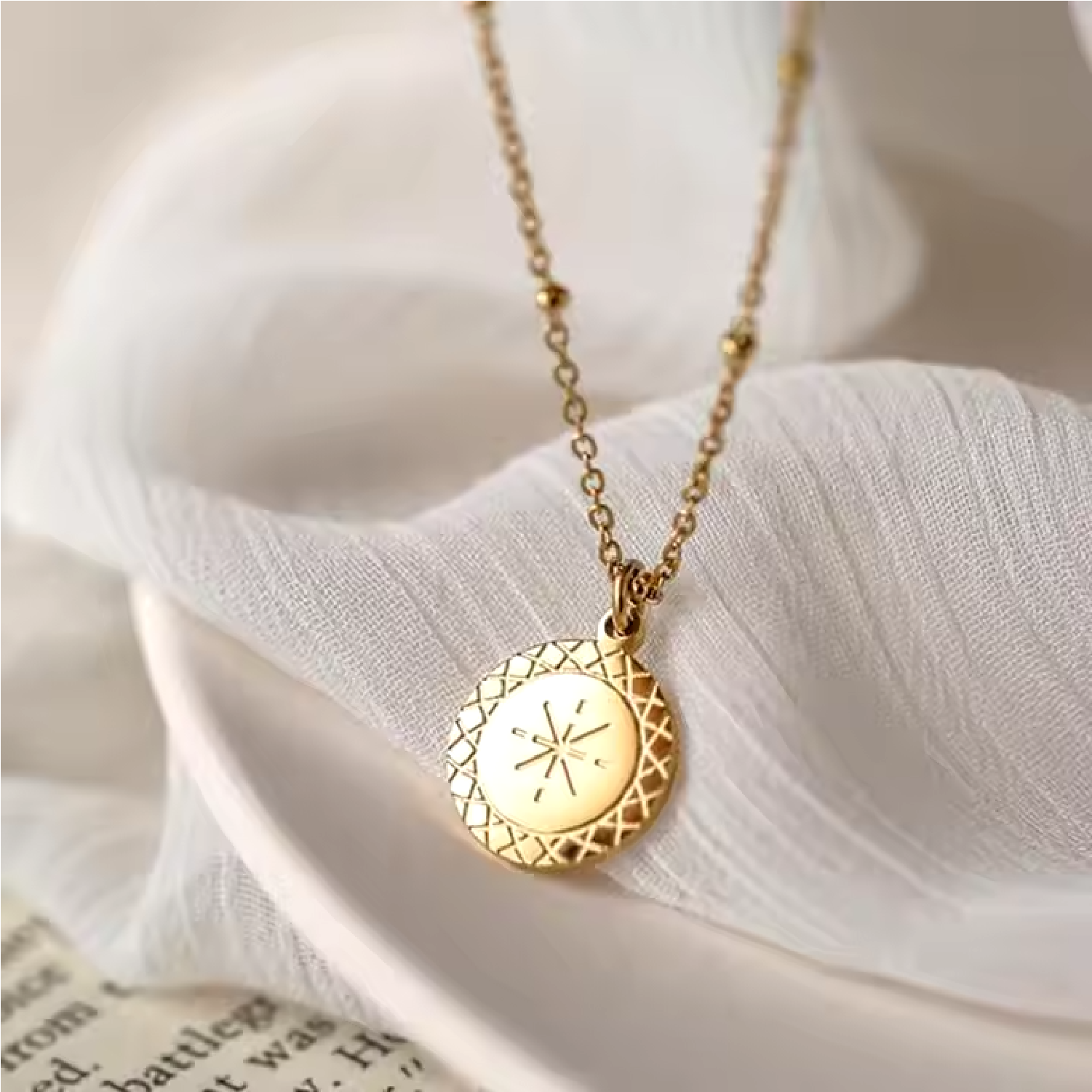 Round Compass Pendant Necklace on Material